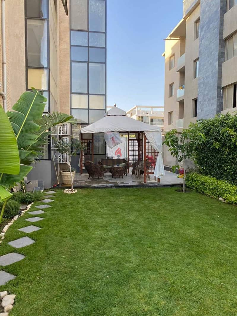 A luxury terrace with a 360-meter garden for sale in the best compound in New Cairo in a very special location on the Suez Road 1