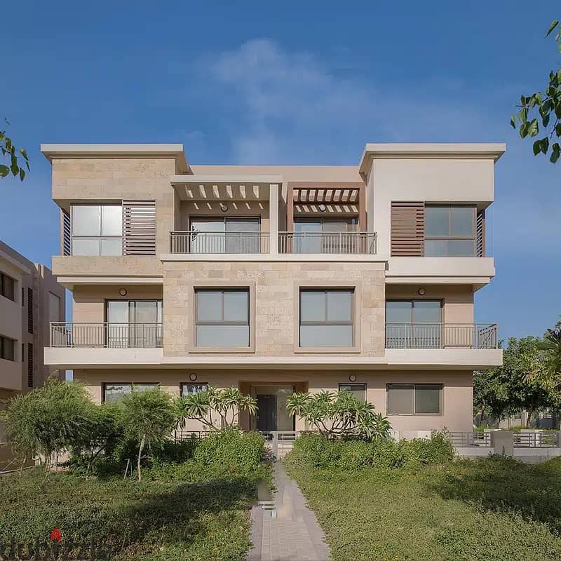 Ground floor apartment with garden for sale in an excellent location in New Cairo on the Suez Road directly in front of Cairo Airport taj city 6