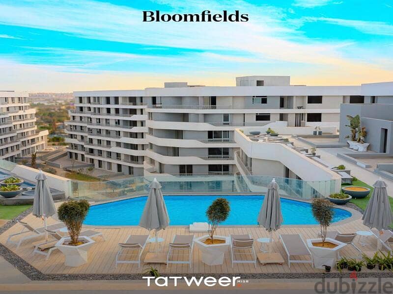 شقة دور ارضي للبيع بمقدم وتقسيط في كمبوند بلوم فيلدز Bloomfields 0