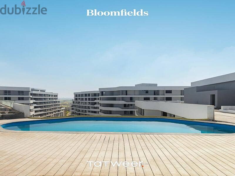 شقة دور ارضي للبيع بمقدم وتقسيط في كمبوند بلوم فيلدز Bloomfields 1