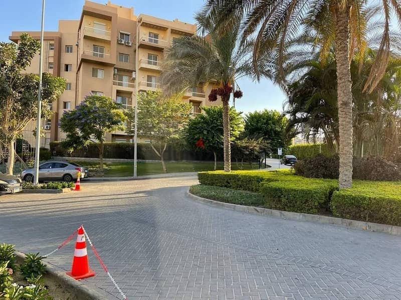 Apartment for sale in 6th of October, with a down payment of 200,000 and installments over 8 years, half finished, in a full-service compound 3