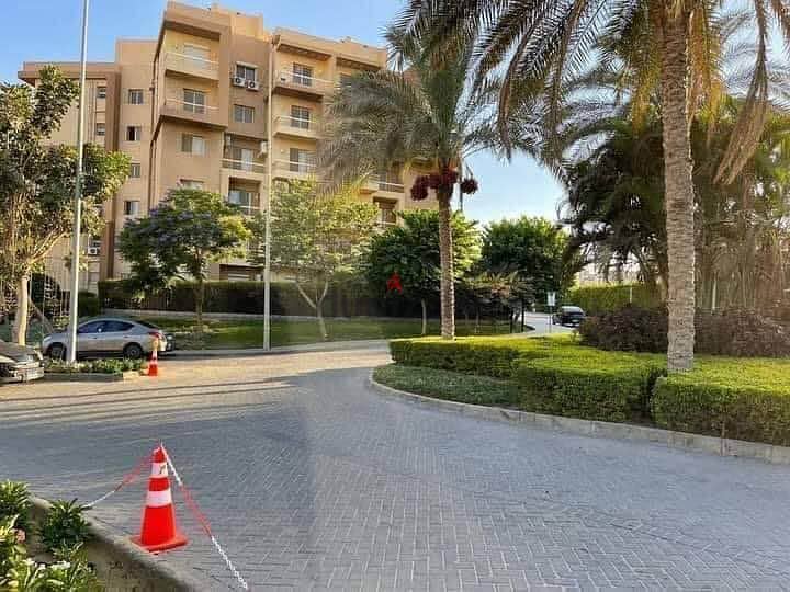 Apartment for sale in 6th of October, with a down payment of 200,000 and installments over 8 years, half finished, in a full-service compound 16