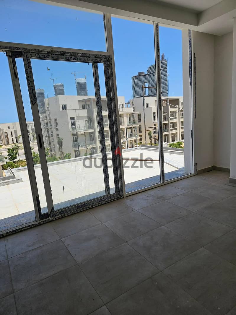 Penthouse 100. M with roof in Mazarine Al Alamein North Coast fully finished with Open View looking over Towers for sale under market price 3