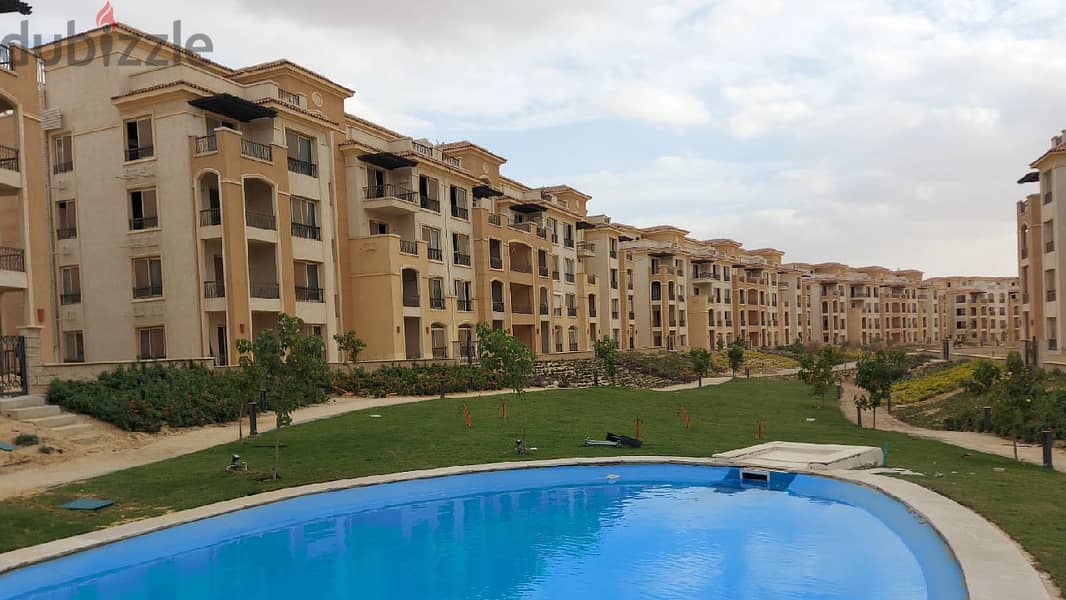 Apartment 200. M with a garden in Stone Residence compound semi finished overlooking the pool under market price 1