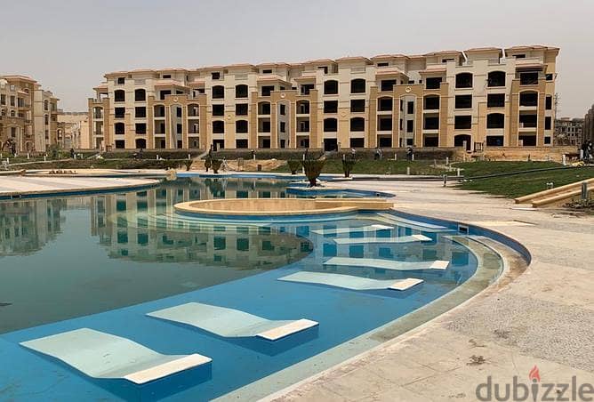 Apartment 200. M with a garden in Stone Residence compound semi finished overlooking the pool under market price 5