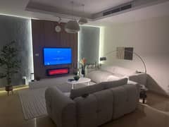 Luxury apartment for rent in Cairo Festival City compound . Garden view