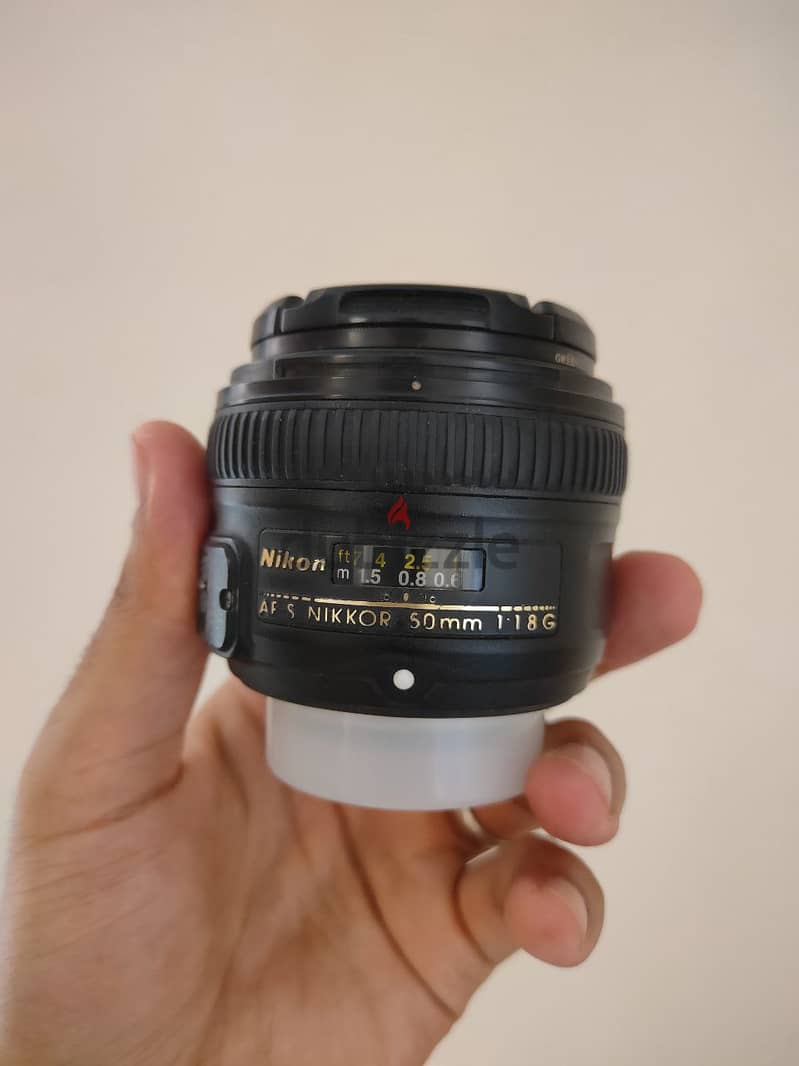 كاميرا Nikon D5200 + 50mm lens 7