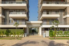 Distinctive split apartment, prime location, for sale in a full-service compound directly in front of Cairo International Airport