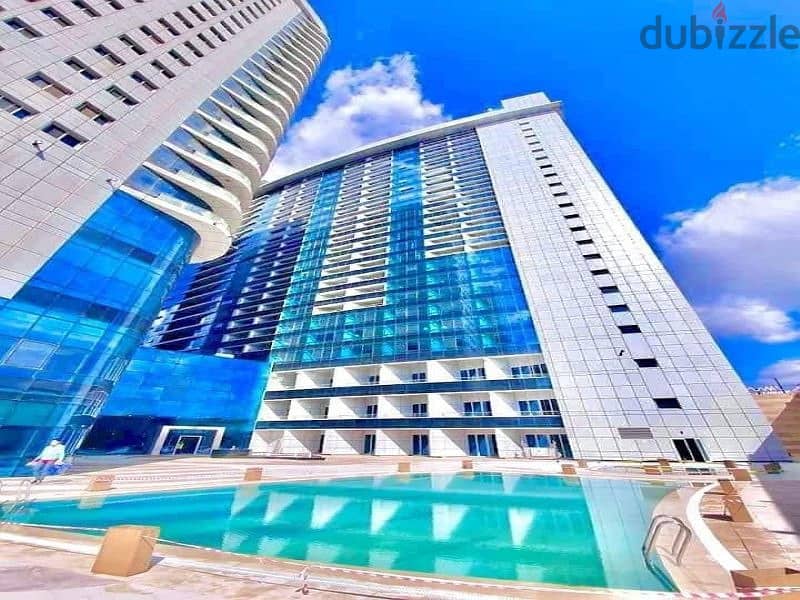 For sale hotel apartment, immediate receipt in installments, finished (with air conditioners + furniture and appliances) overlooking the Nile, directl 1