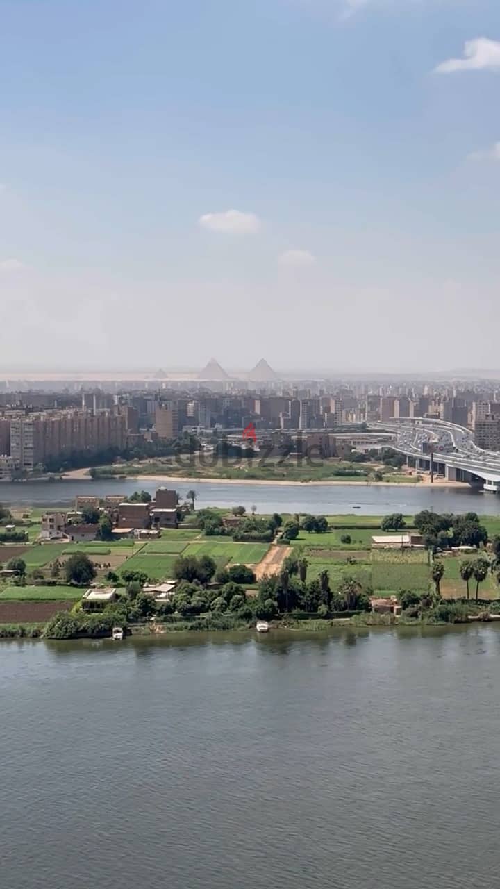 For sale hotel apartment, immediate receipt in installments, finished (with air conditioners + furniture and appliances) overlooking the Nile, directl 7