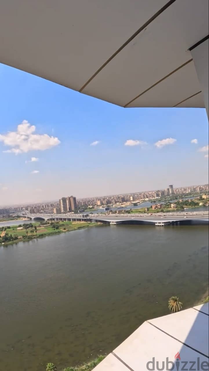 For sale hotel apartment, immediate receipt in installments, finished (with air conditioners + furniture and appliances) overlooking the Nile, directl 9