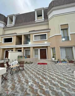 Villa for sale, 238 meters, 3 floors + private garden, view on the landscape, on the Suez Road, next to Madinaty installments over the longest paymetn