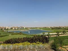 own a palace in my city overlooking the largest lakes and golf courses in the city, directly in front of the Four Seasons Hotel.
