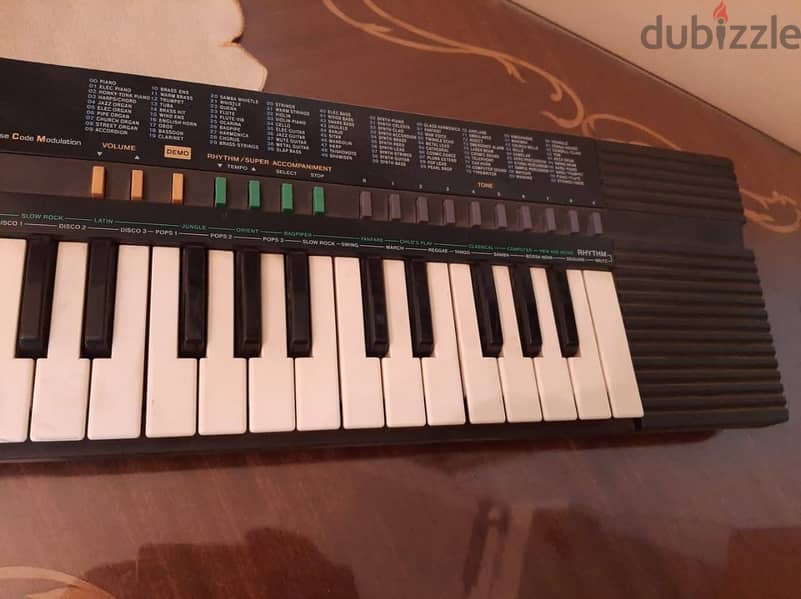 أورج CASIO كوري أصلي أكثر من 100 ايقاع وأله موسيقية مدمجة . 32 مفتاح 5