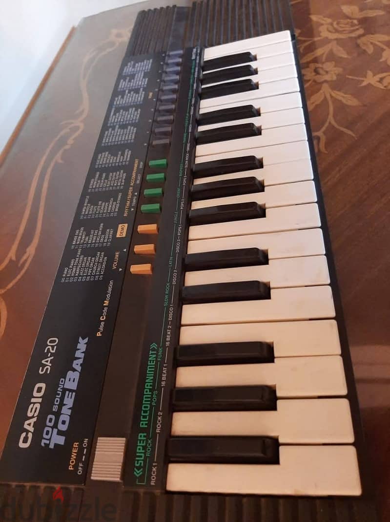 أورج CASIO كوري أصلي أكثر من 100 ايقاع وأله موسيقية مدمجة . 32 مفتاح 3