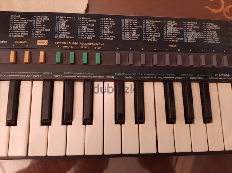 أورج CASIO كوري أصلي أكثر من 100 ايقاع وأله موسيقية مدمجة . 32 مفتاح 4