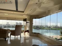 A fully finished luxury apartment with upscale furnishings directly on the Nile, hotel services, ready immediately for immediate receipt, installments
