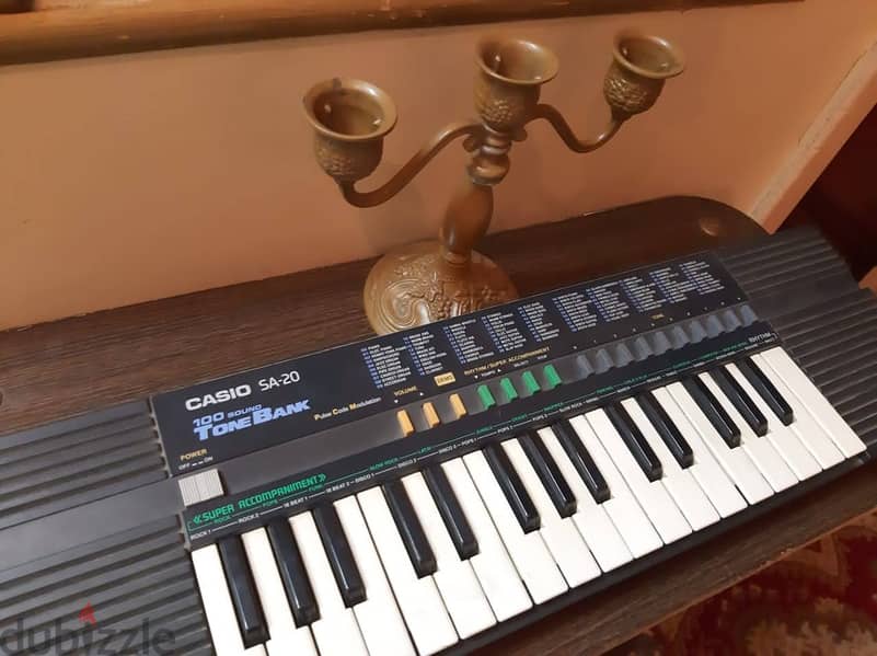 أورج CASIO كوري أصلي أكثر من 100 ايقاع وأله موسيقية مدمجة . 32 مفتاح 11