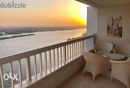 A luxury hotel apartment for sale on the Maadi Corniche, immediate receipt, fully finished, in the most prestigious tower on the Corniche,