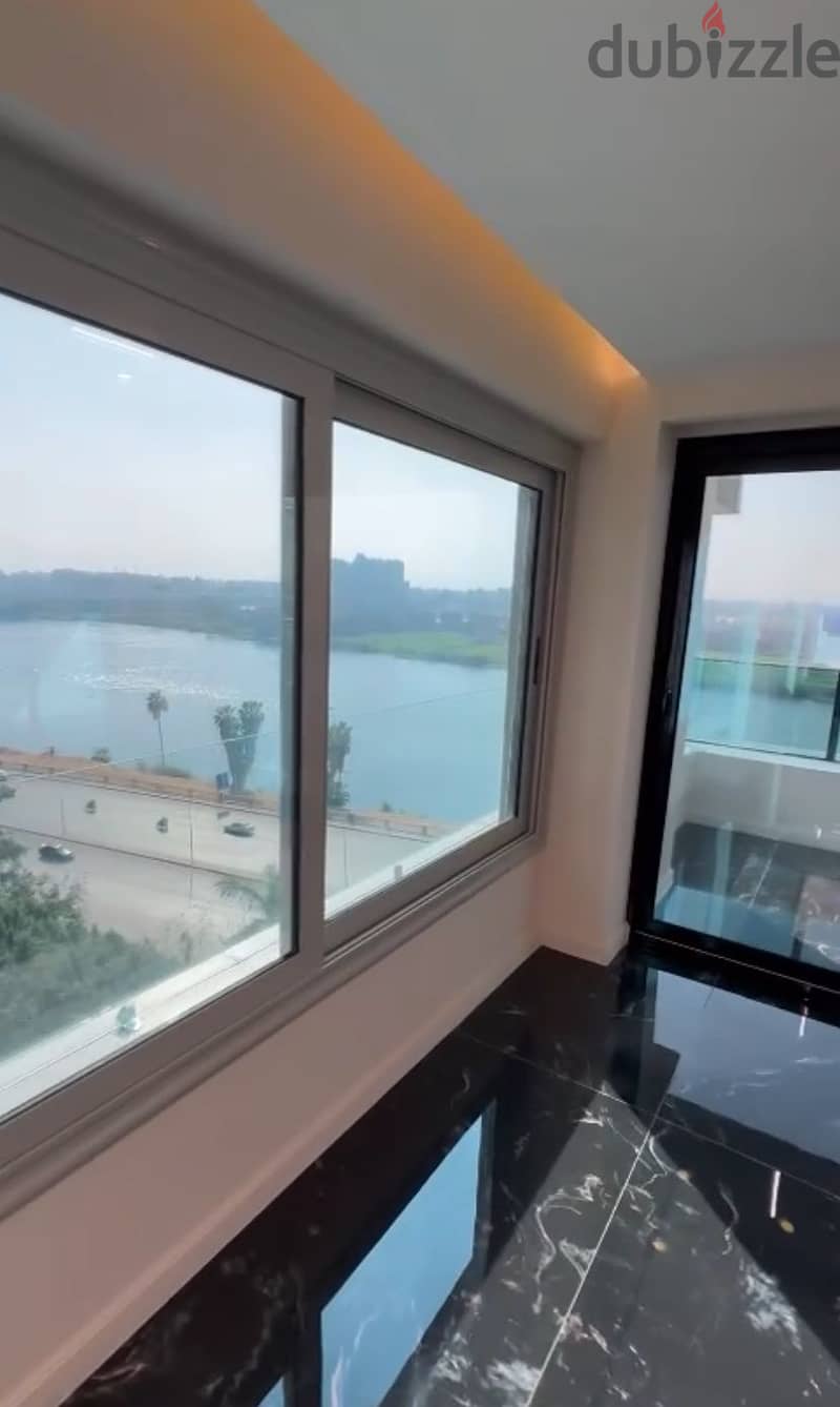75 sqm apartment for sale, immediate receipt, fully finished with furniture and appliances, next to the Hilton in front of the Nile in Reve Du Nil, Ma 2