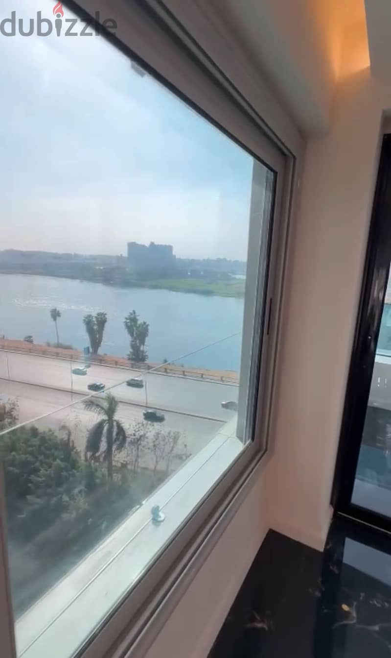 For sale, an apartment directly on the Nile, with a down payment of 6 million, with a mandatory rental contract to rent the unit in Maadi 7