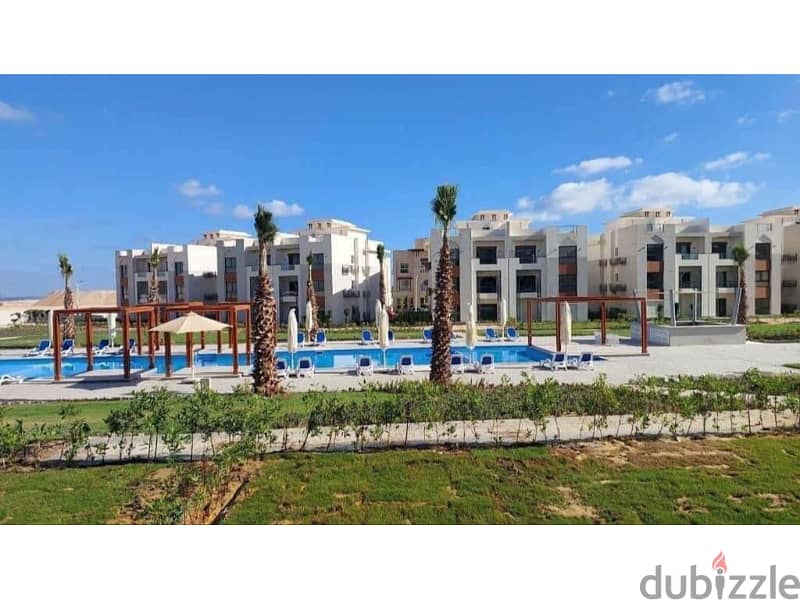 FOR SALE IN GAIA AL Ahly Sabbour  ( Ras El Hekma ) prime location overlooking pools and sea view 14