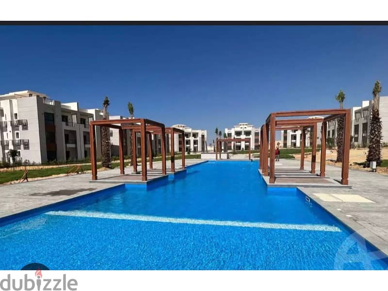 FOR SALE IN GAIA AL Ahly Sabbour  ( Ras El Hekma ) prime location overlooking pools and sea view 17