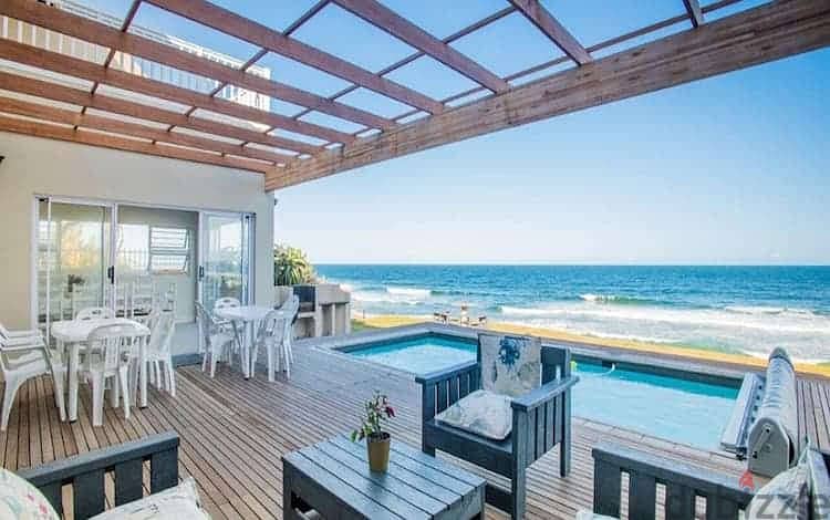 A chalet with a fabulous view directly on the sea, fully finished, in the finest resort on the North Coast in Salt, developed by Tatweer Misr. 7