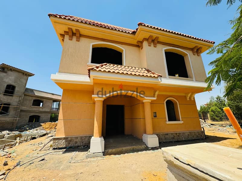 A villa for sale in Madinaty, detached and unfinished, with the best view. It is fully paid off and has the largest land area for its model 5
