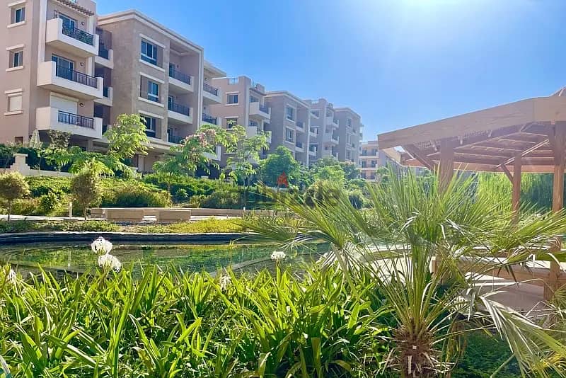 Apartment 162 meters with large garden in a very special location in a high-end compound in New Cairo directly in front of Cairo Airport in Taj City 4