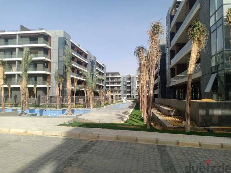 A luxury apartment with a private garden, fully finished, immediate receipt, ready to move in, in the heart of El Tajma, La Vista El Patio 7 6