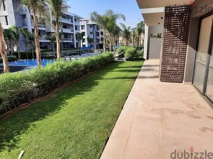 A luxury apartment with a private garden, fully finished, immediate receipt, ready to move in, in the heart of El Tajma, La Vista El Patio 7 9