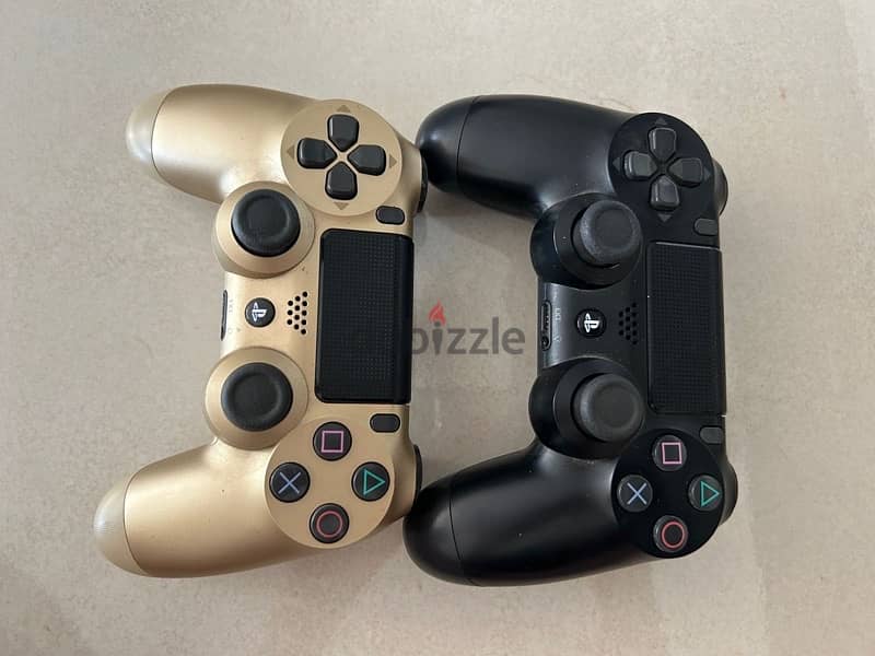 play station 4 pro with two controllers 4