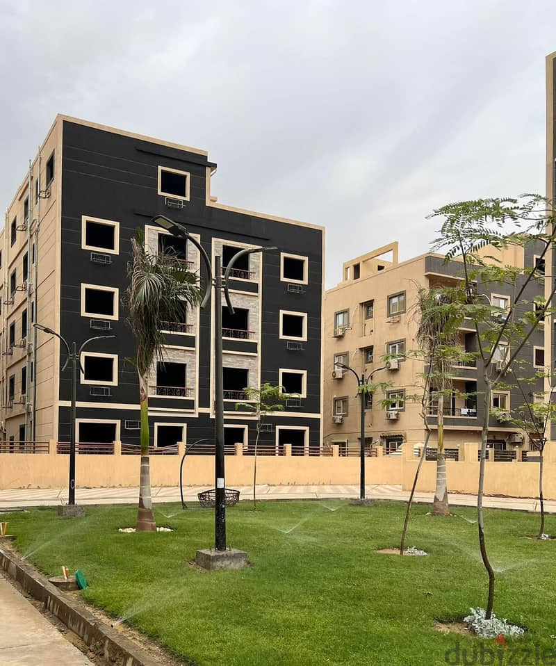 pay 15% | Ready to move apartment | beside AUC  | installments 6 years 1