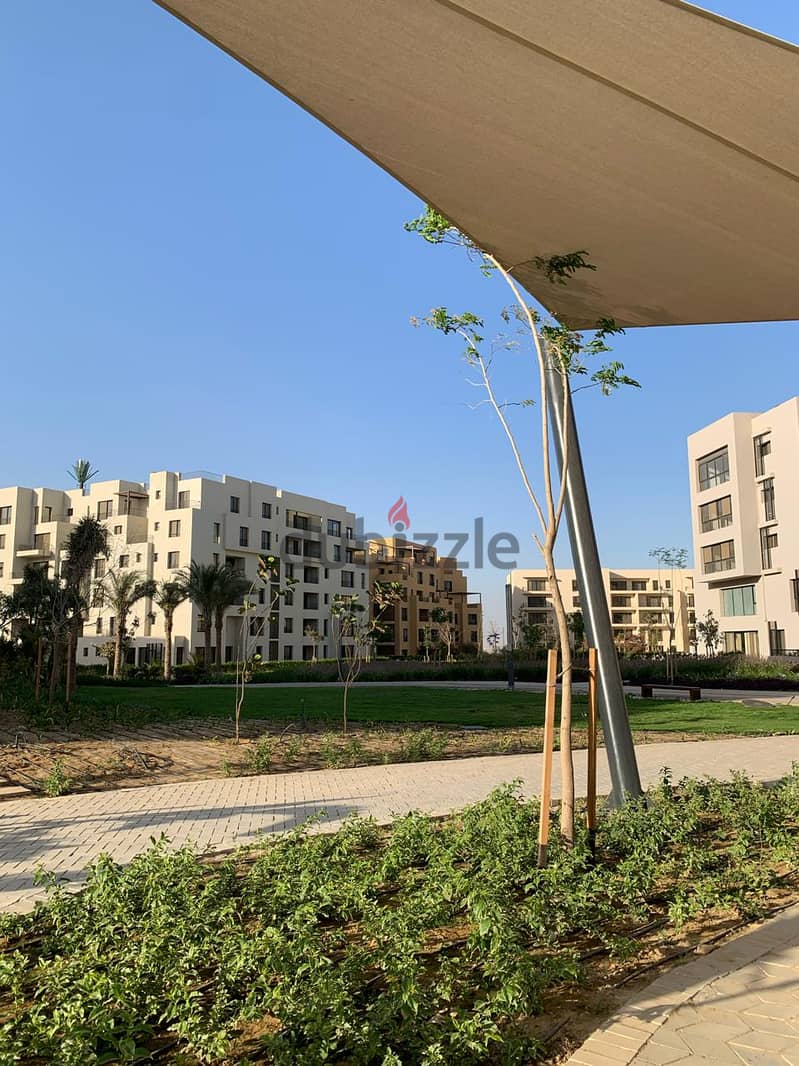 شقة بجاردن للبيع بكمبوند أويست Apartment with garden for sale at Owest 10