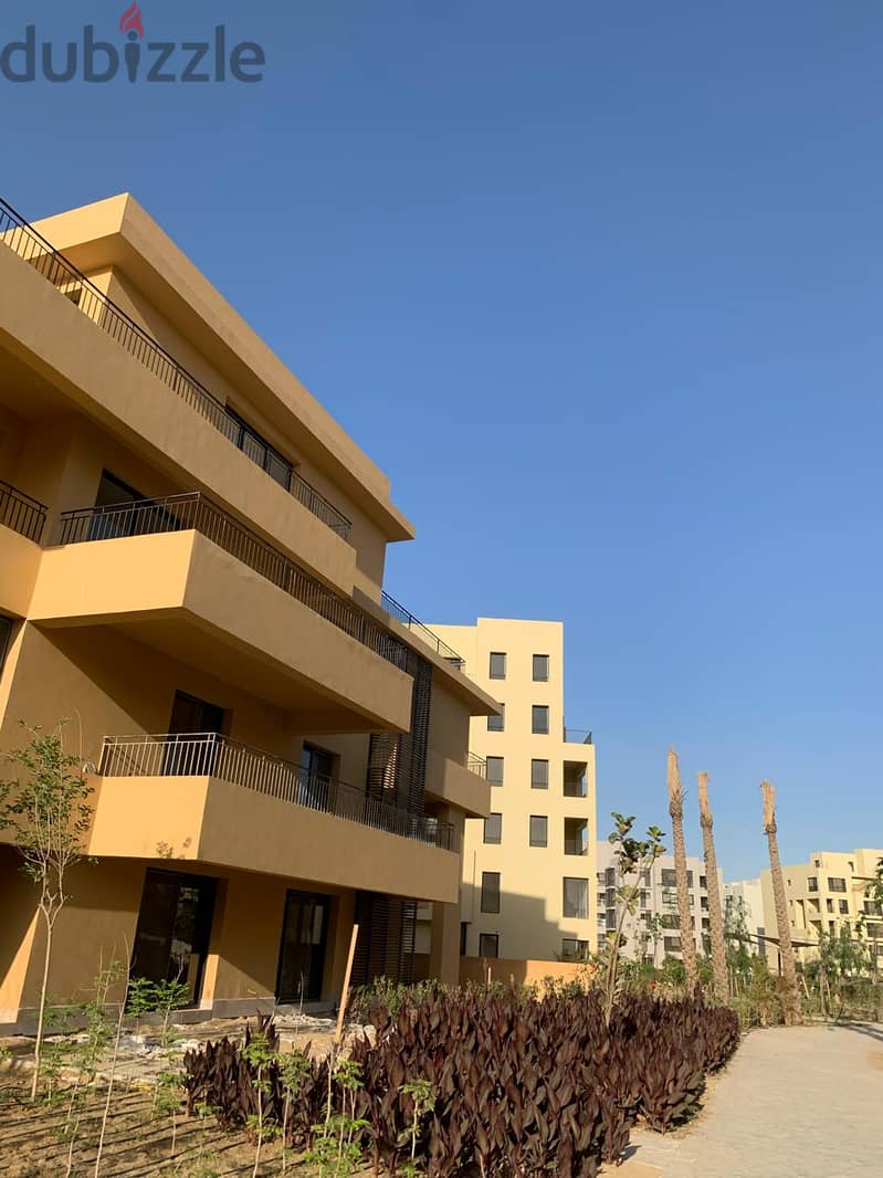 شقة بجاردن للبيع بكمبوند أويست Apartment with garden for sale at Owest 12