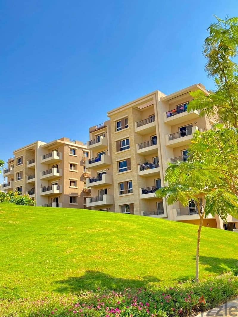 Apartment for sale in the Fifth Settlement in Taj City Compound, in interest-free installments, with a distinctive view with a landscape view 17