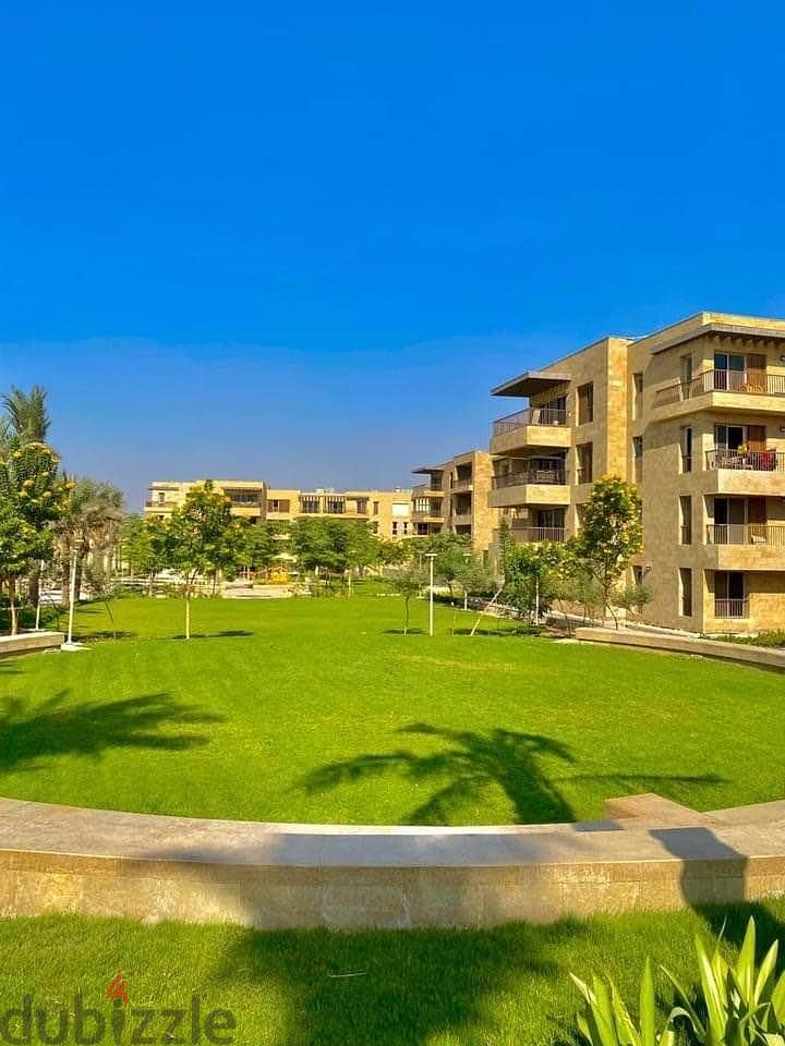 Apartment for sale in the Fifth Settlement in Taj City Compound, in interest-free installments, with a distinctive view with a landscape view 19