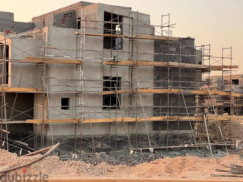 The last townhouse at the old price in Sheikh Zayed, with a direct landscape view on Dahshur Road, with installments over 8 years 3