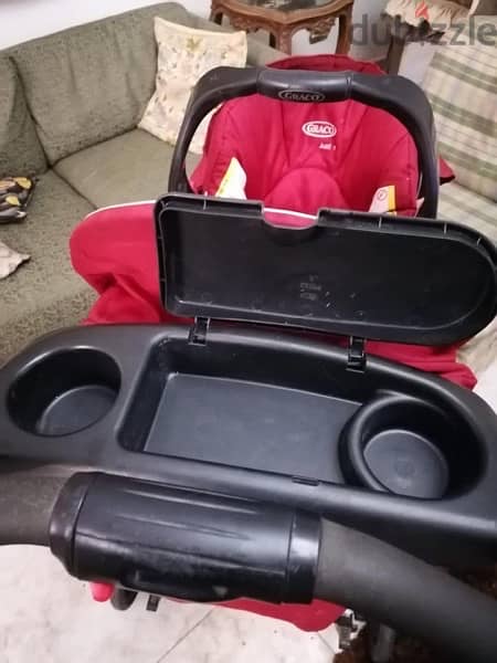 car seat and stroller and kids bed 1
