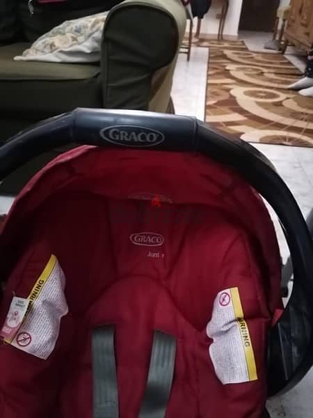 car seat and stroller and kids bed 7