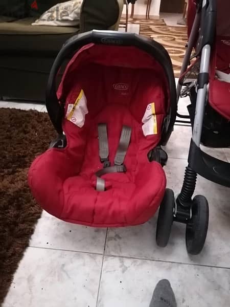 car seat and stroller and kids bed 9