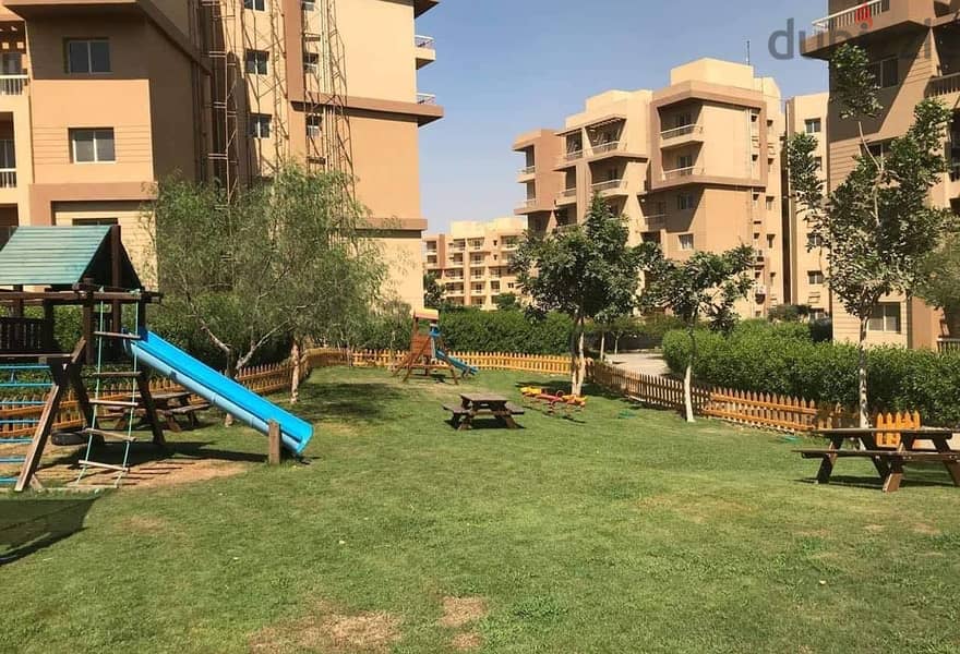 Apartment for sale in Ashgar City Compound in October Gardens with a 5% down payment and the rest over the longest payment period 6