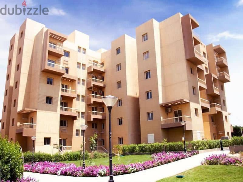 Apartment for sale in Ashgar City Compound in October Gardens with a 5% down payment and the rest over the longest payment period 12