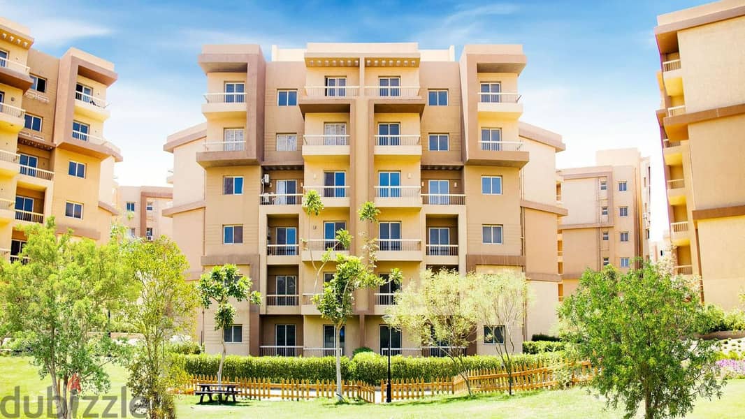 Apartment for sale in Ashgar City Compound in October Gardens with a 5% down payment and the rest over the longest payment period 19