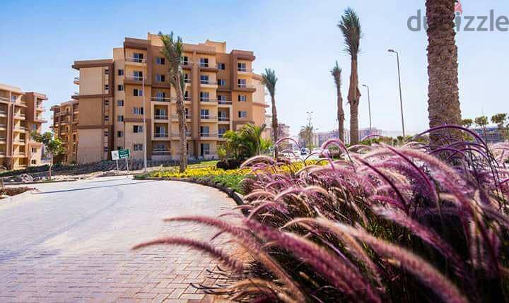 Apartment for sale in Ashgar City Compound in October Gardens with a 5% down payment and the rest over the longest payment period 26