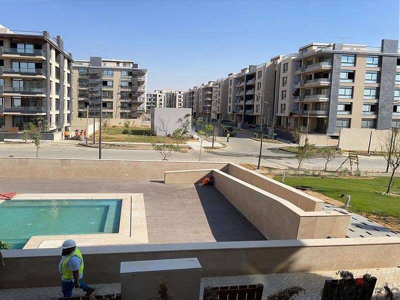3-bedroom apartment for sale in Azad Compound in the heart of Fifth Settlement | Ready To Move ,4/3 finishing | view of the landscape and the swimming 20
