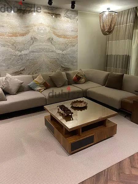 Garden apartment for sale in 6th of october in | Mountain View Icity October | in Boulevard Axis directly on laggon view with a prime location 5