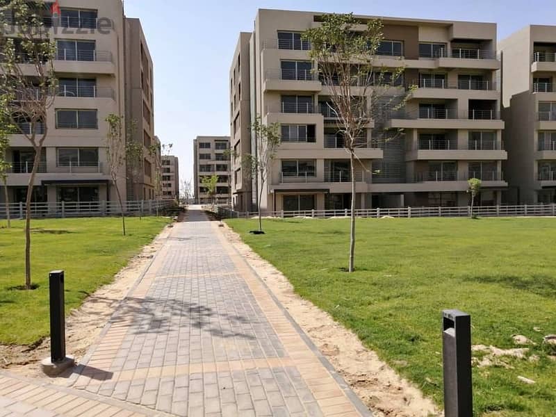 استلام فوري شقة متشطبة للبيع كمبوند بالم هيلز القاهرة الجديدة Palm Hills New Cairo 11