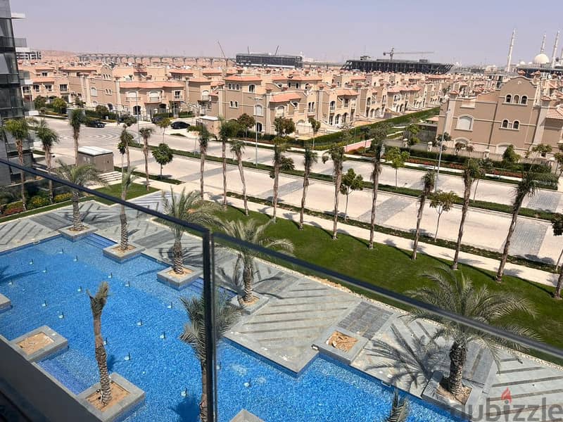 Apartment with Garden For Sale Ready To Move Prime Location Open view on landscape Resale Patio Oro New Cairo 9